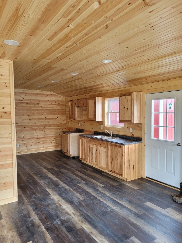 tiny home kitchen with wood finish
